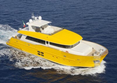 yellow motor yacht, ocean, Caribbean,
