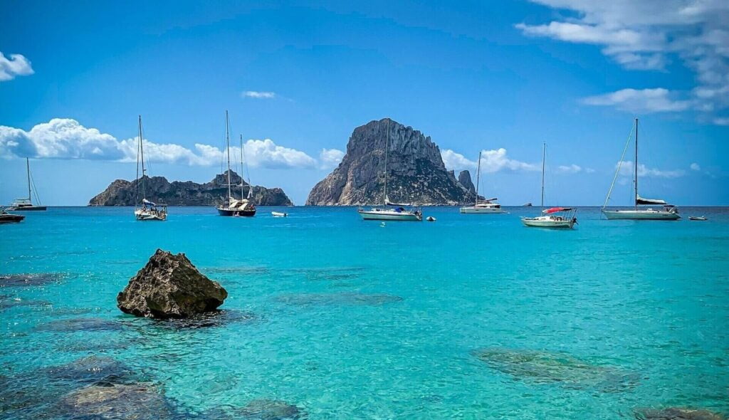 best yacht locations 2025, Ibiza, moored, yachts, blue sea, blue sky, azure,